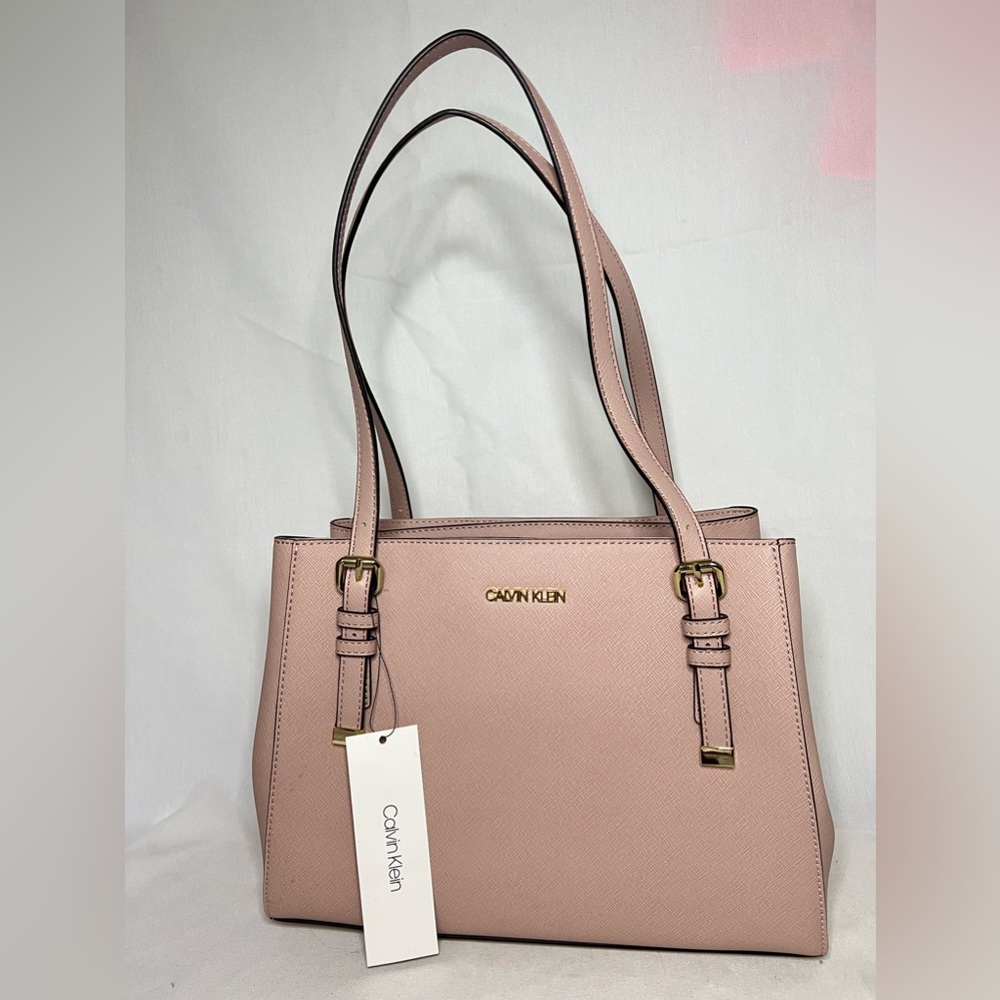Beautiful Calvin Klein handbag in color Blush Pink
New with tags
Genuine leather